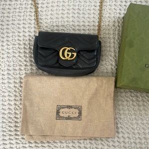 Almost new weared couple of times . Gucci bag with gold chain and dust bag